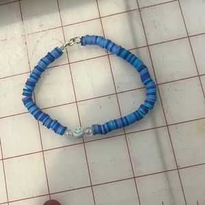 blue smiley face bracelet